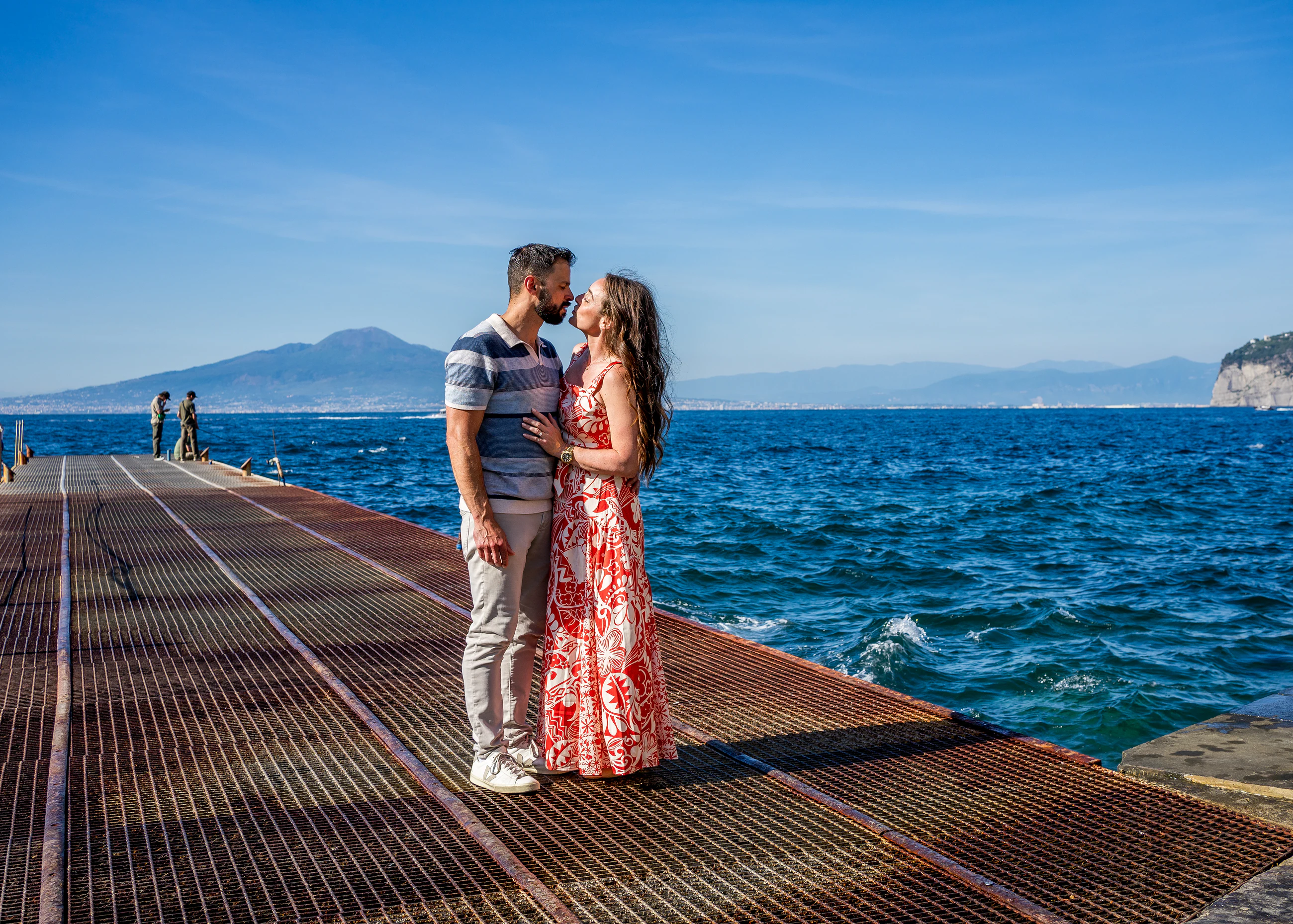 Couple portrait overlooking the blue sea